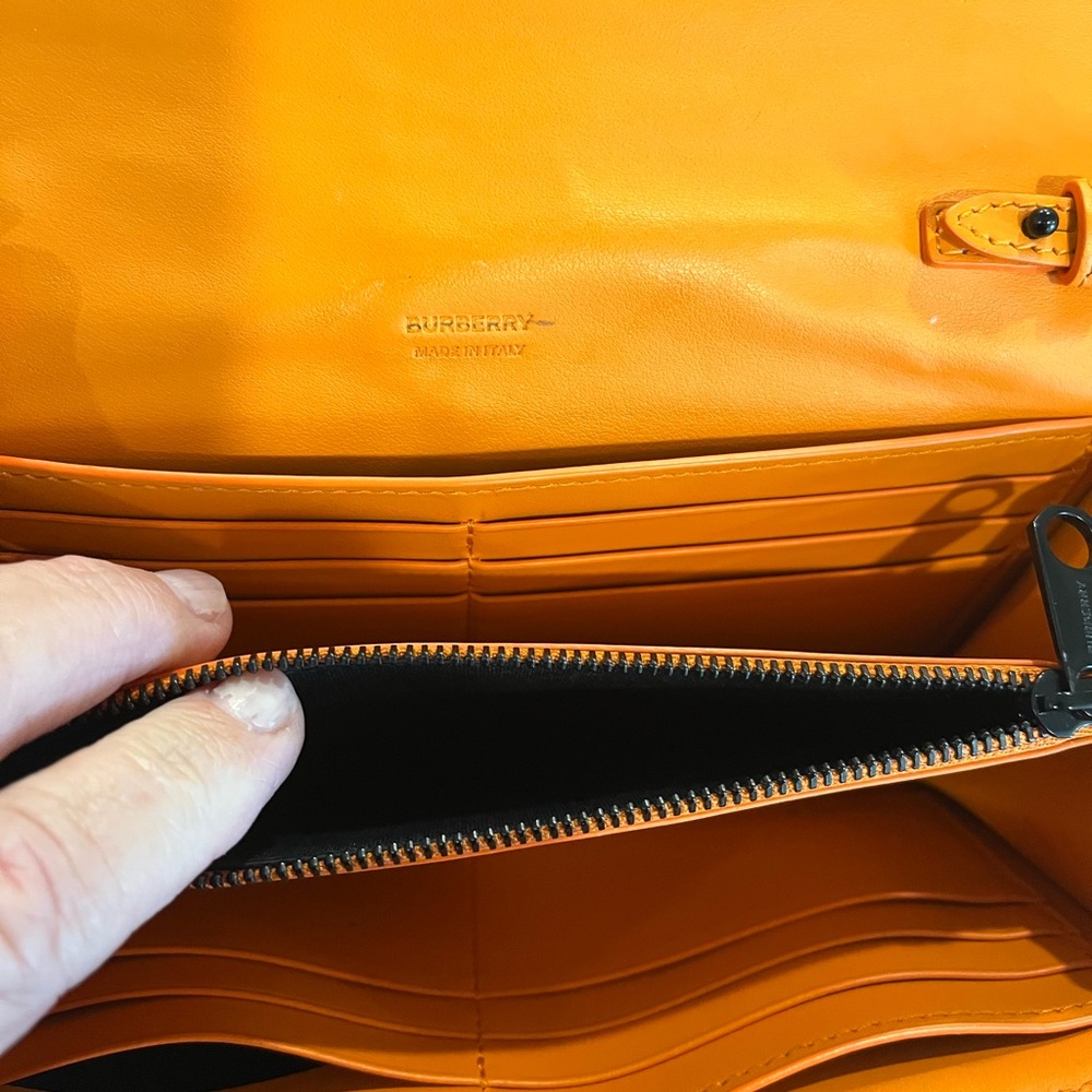 Burberry flap bag.